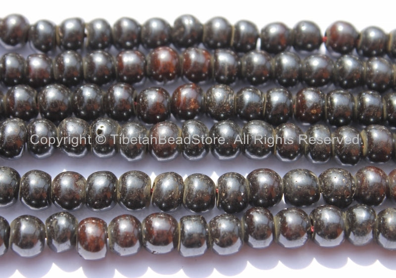 2 beads - Tibetan Lustrous Brown Copal Beads with Double Vajra